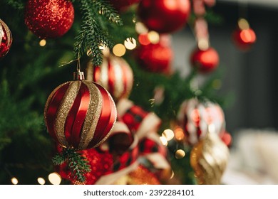 Close up of res shiny balls hanging on Christmas tree - Powered by Shutterstock