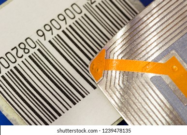 Close Up Of RFID Tags Ana A Code Bar Used For Tracking And Identification Purposes And As An Anti-theft System In Commerce And Retail.