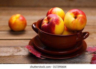 Close Up Of Ripe Peaches. Nectarines