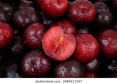 Close up of ripe plums with water drops - Powered by Shutterstock