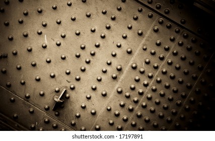 A Close Up Of Rivets On A Bridge Section