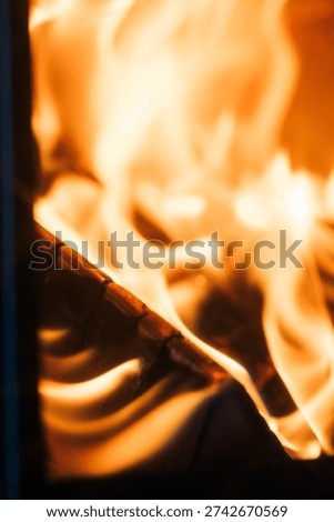 close up of a roaring log fired sauna in Sweden