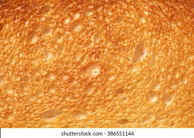 Close Up Roasted Bread Background Texture. Macro Photo