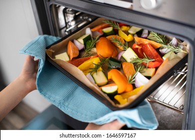 Close Up Of Roasting Tray Of Vegetables For Vegan Meal In Oven