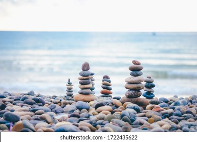 Close Up Of Rocks Stacked One On Top Of Another With Soft Selective Focus. Stones Are Naturally Balanced On The Background Of The Sea. High-quality Free Stock Images Of Rocks And Landscapes