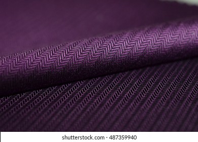 Close Up Roll Purple Fabric Of Shirt, Photo Shoot By Depth Of Field For Object