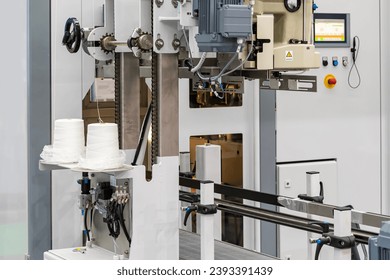 Close up roll of thread and thread feeder kit component for bag sewing closures of of automatic weighing bag filling packing machine in industrial