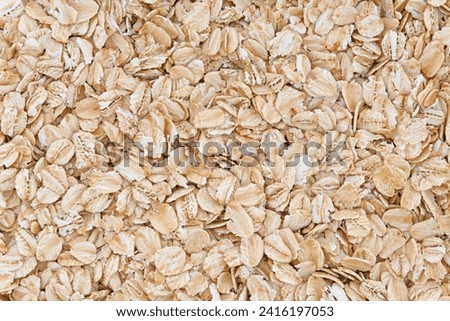Close up of rolled oats scattered on the floor
