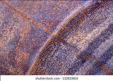 Close Up Of Rough Surface Of Rusty Oil Barrel