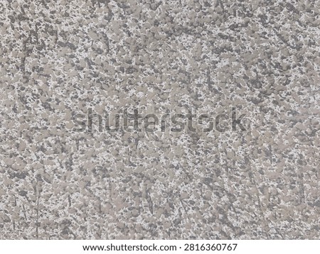 Close up of a roughcast wall featuring a speckled mix of grey and white paint, creating a highly tactile, industrial pebbledash surface texture.