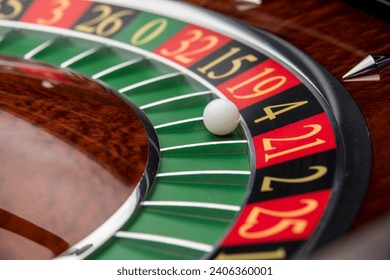 Close up roulette wheel white ball