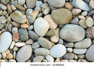 Close Up Of Rounded And Polished Beach Rocks