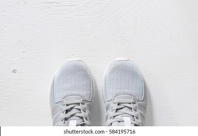 Close Up Running Shoes  On Rustic Wood.