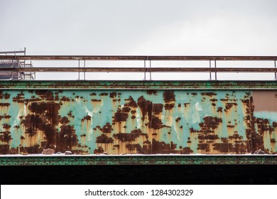 Close up of rust and corrosion on the train tracks of Chicago's elevated 