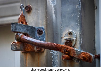 Close Up Of A Rusted Lock On Gate 