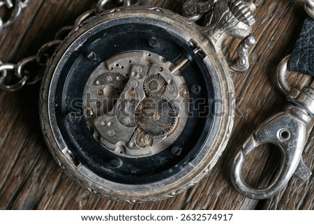 close up of rusty movement on pocket watch                               