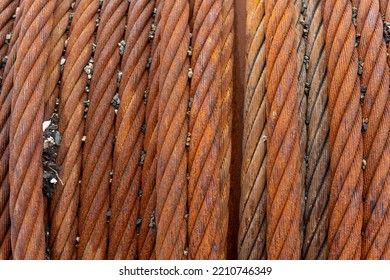 Close Up Of Rusty Steel Cable Coiled On A Drum.