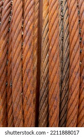 Close Up Of Rusty Steel Cable Coiled On A Drum.