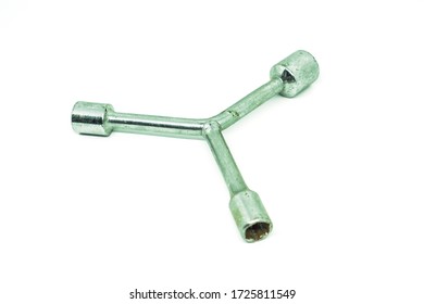 Close Up Of A Rusty Y-shaped Lug Wrench Isolated On White Background.