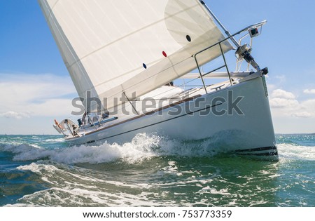 Close up of sailing boat, sail boat or yacht at sea