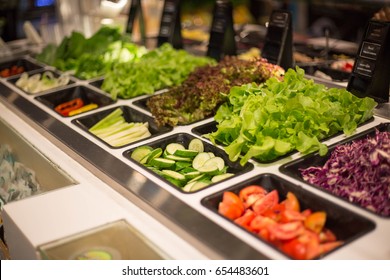 Close Up Salad Bar With Various Fresh Vegetables At Supermarket.