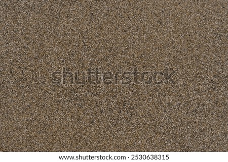 Close up of sand pattern at beach. Seamless sand. Brown sand. Sand texture.