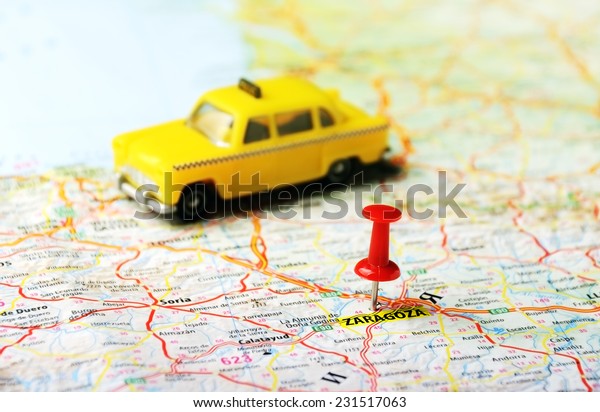Close up of Saragossa ,Spain  map taxi  and red\
pin - Travel concept