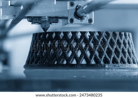 Close up scene the additive manufacturing by 3D printer machine. The high technology manufacturing process by rapid prototype method. 