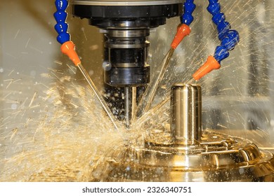 Close up scene the CNC milling machine cutting the shell mold parts with oil coolant method . The mold and die manufacturing process by machining center with the solid ball endmill tools. - Shutterstock ID 2326340751