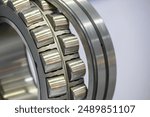 Close up scene the disassembly spherical roller bearing parts. The heavy mechanical part manufacturing concept.