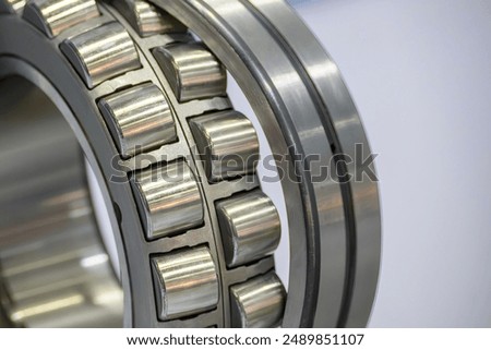 Close up scene the disassembly spherical roller bearing parts. The heavy mechanical part manufacturing concept.