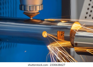 Close up scene the fiber laser cutting machine cutting  machine cut the stainless steel tube. The hi-technology sheet metal manufacturing process by laser cutting machine.  - Powered by Shutterstock