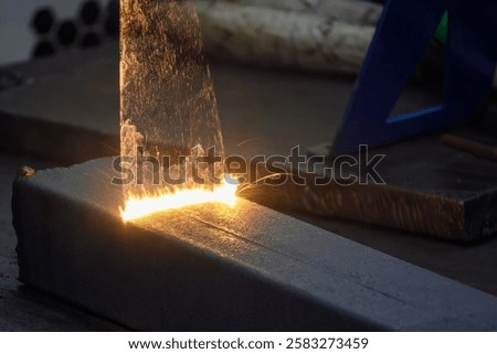Close up scene rust cleaning process by portable laser cleaning machine. The rust removing on the pipe by laser cleaner machine.
