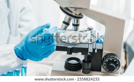 Close up scientist conducting precise virus lab test, scientific methodology, microbiologist conducting virus detection and testing in progress
