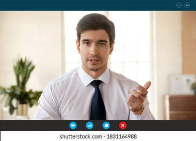 Close Up Screen View Headshot Portrait Of Serious Caucasian Businessman Talk Speak On Video Call In Office. European Male Employee Have Webcam Virtual Event Conference, Engaged In Online Meeting.