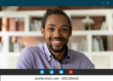 Close up screen view portrait of smiling African American man speak talk on video call. Happy biracial male have webcam digital conference conversation, involved in web online meeting or briefing.