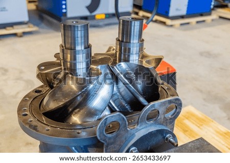 Close up of screw compressor rotors highlighting precision engineering in industrial machinery