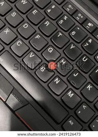 Close up scrolling button on laptop