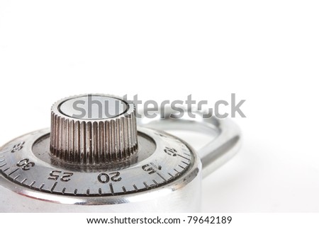 close up of a secure combination dial silver padlock