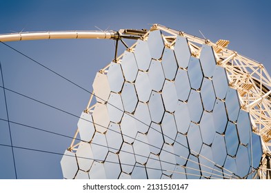 Close up of the segmented mirror of a large radio telescope. hexagonal mirrors. High tech science. MAGIC telescopes. Roque de los Muchachos Astrophysics Observatory. La Palma, Canary Islands Spain