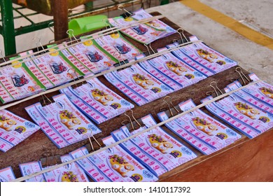 Close up and selective focus many of Vietnam Lottery put together waiting for distribution.The legal and popular gambling luck of the Vietnamese.Hoi An,Vietnam.May 29,2019.