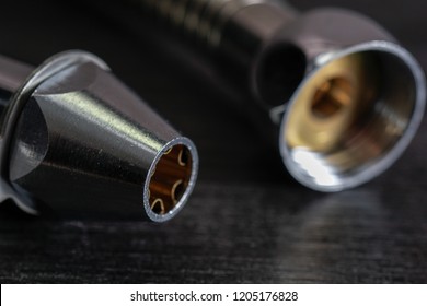 Close Up With Selective Focus Of A Metal Bidet / Hose