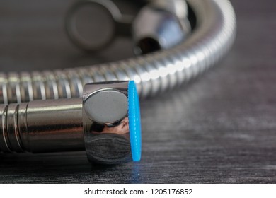 Close Up With Selective Focus Of A Metal Bidet / Hose