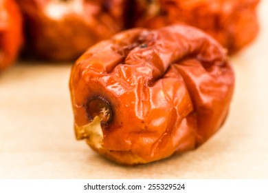Close up and selective focus on the dried Chinese Red Dates at the foreground