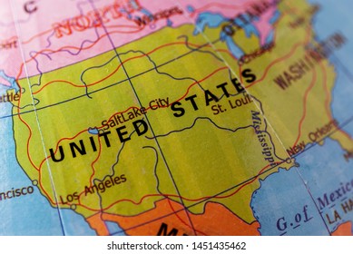 Close up selective focus to the USA or United States or America on a colorful world globe in a political, travel or educational concept - Shutterstock ID 1451435462