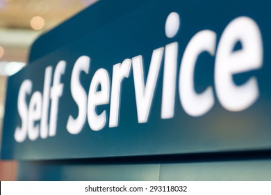 close up of self service sign at airport