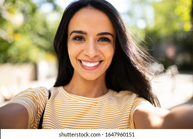 Close Up Selfie Portrait Smiling North African Young Woman Outside