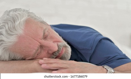 Close Up of Senior Old Man Sleeping in Bed