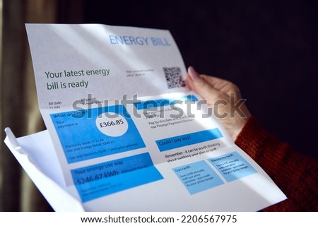 Close Up Of Senior Woman Opening UK Energy Bill Concerned About Cost Of Living Energy Crisis