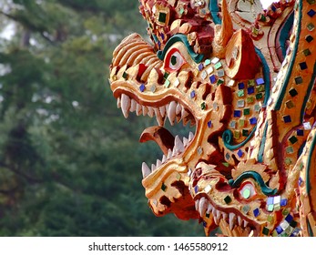 Close up serpent head statue.
